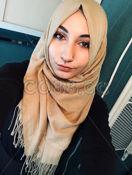 Young Beautiful Muslim Woman in Traditional Hijab - CO88.co