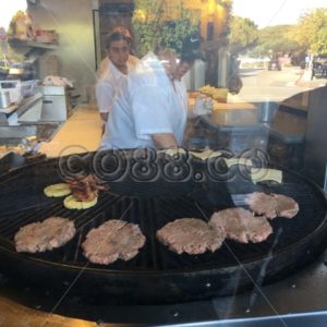 Line Cooks busy at work at „Hamburgers“, a 42 year old small Burger Joint located in Sausalito - CO88.co