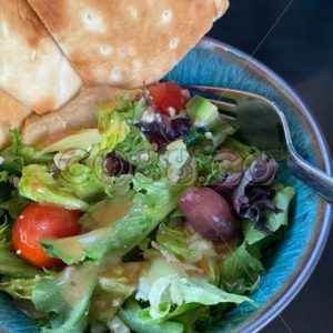 Traditionell Greek Salad served with savory Hummus and garnished with toasted Pita Bread - CO88.co