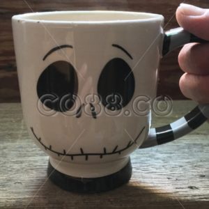 Jack Skellington’s Face (The Nightmare Before Christmas) Striped Ceramic Mug with Steaming Coffee - CO88.co