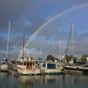 LGBTQ PRIDE – Gorgeous Rainbow spanning above a small Marina near San Francisco, California - CO88.co