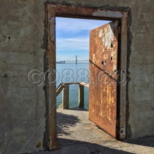 Outlook! Heavy Rusty Iron Door on Alcatraz – Island of the Pelicans with View of Golden Gate Bridge - CO88.co