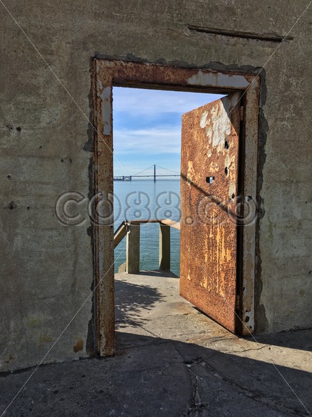 Outlook! Heavy Rusty Iron Door on Alcatraz – Island of the Pelicans with View of Golden Gate Bridge - CO88.co